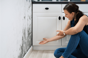 woman sees mildew