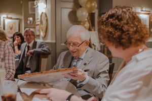 Old man is chatting in care facility