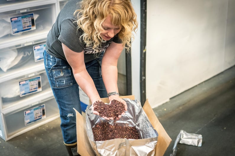 woman is checking the ingredients